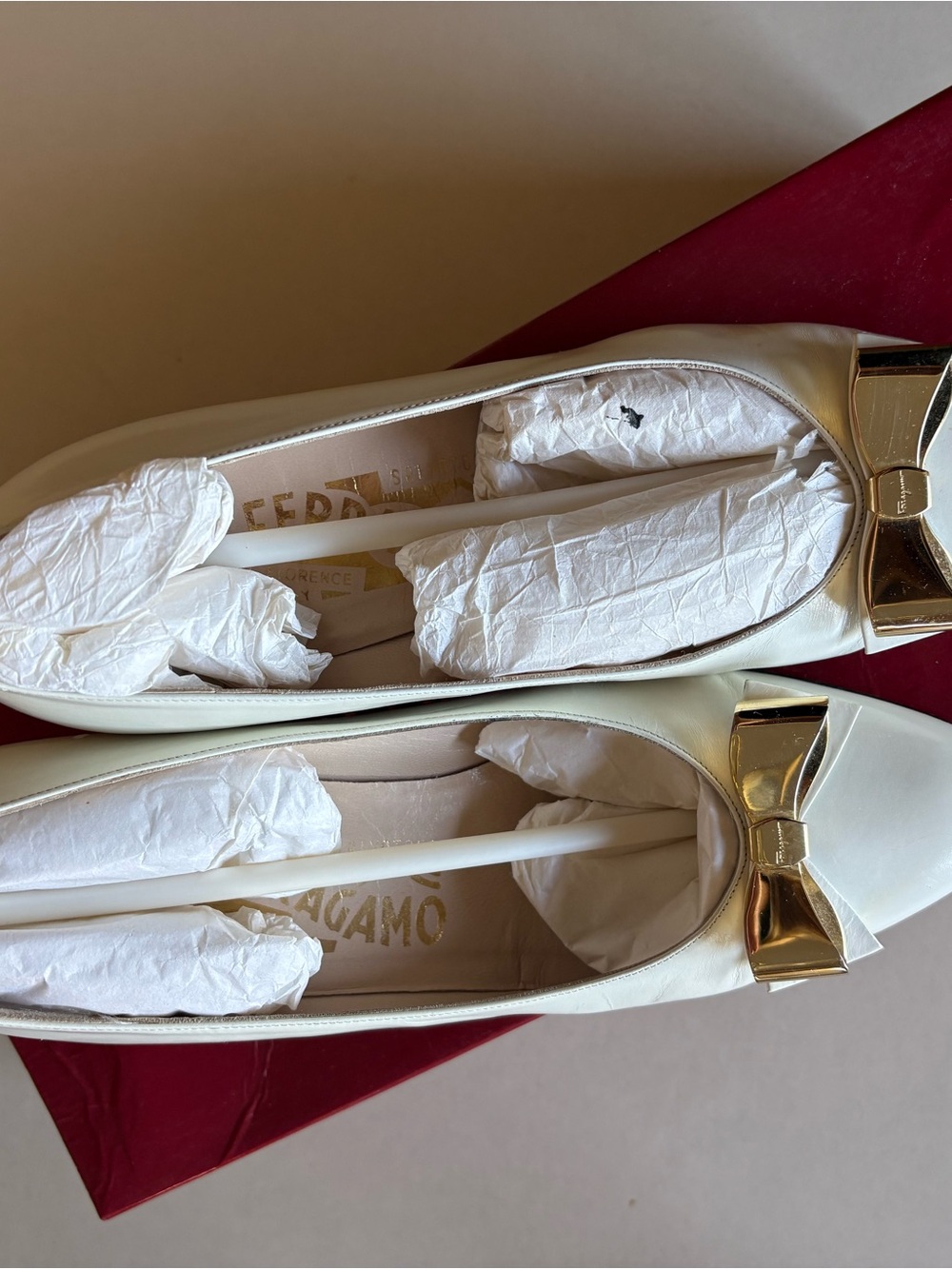 Salvatore Ferragamo Cream Leather Bow with Gold Accent